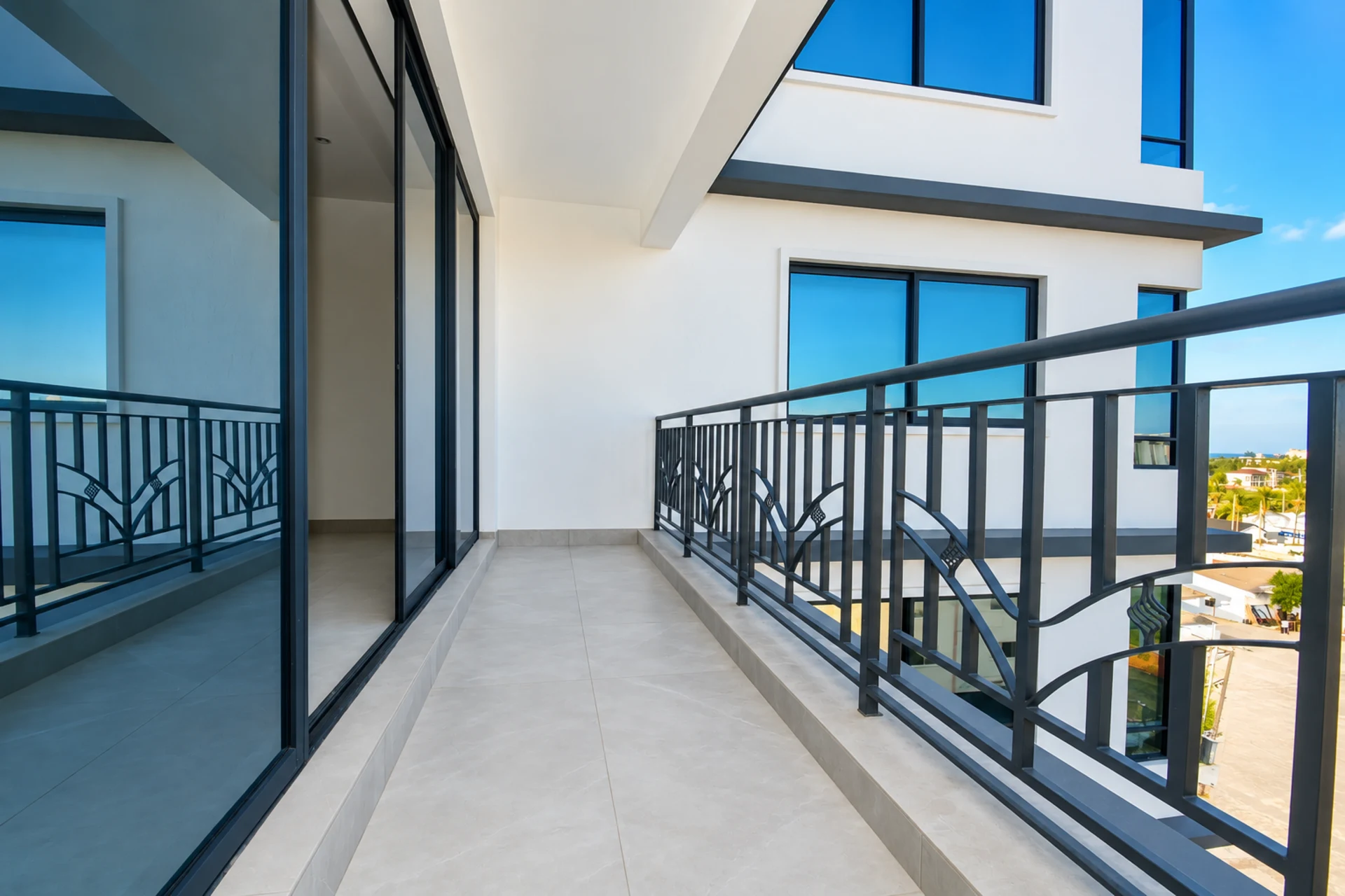 A long balcony running the width of the apartment