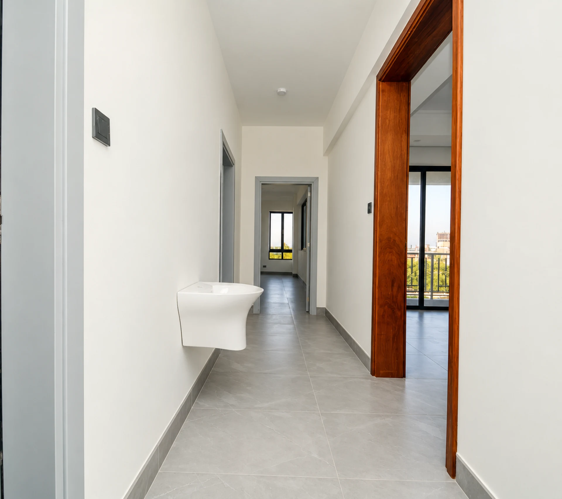 A hallway leading to the bedrooms